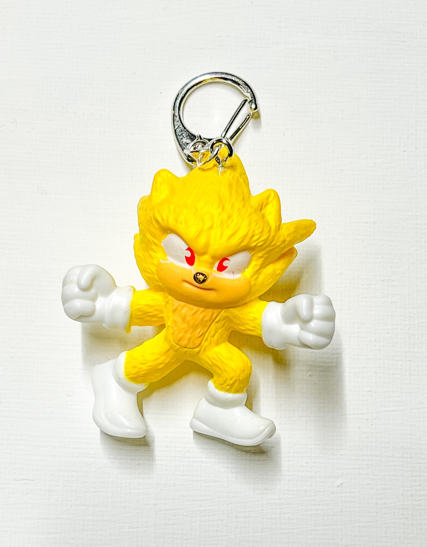 Upcycled Yellow Action Hero Key Chain – Bold, Fun & Full of Energy